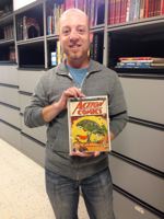 Steve Younis Holding Action Comics #1
