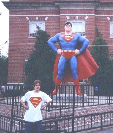 Josh in front of the Superman statue